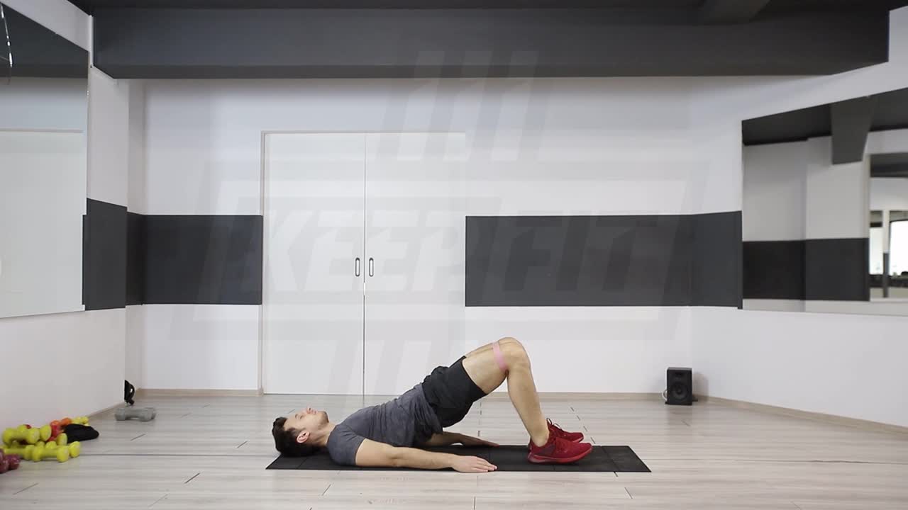 Hip Raise With Knee Pressout