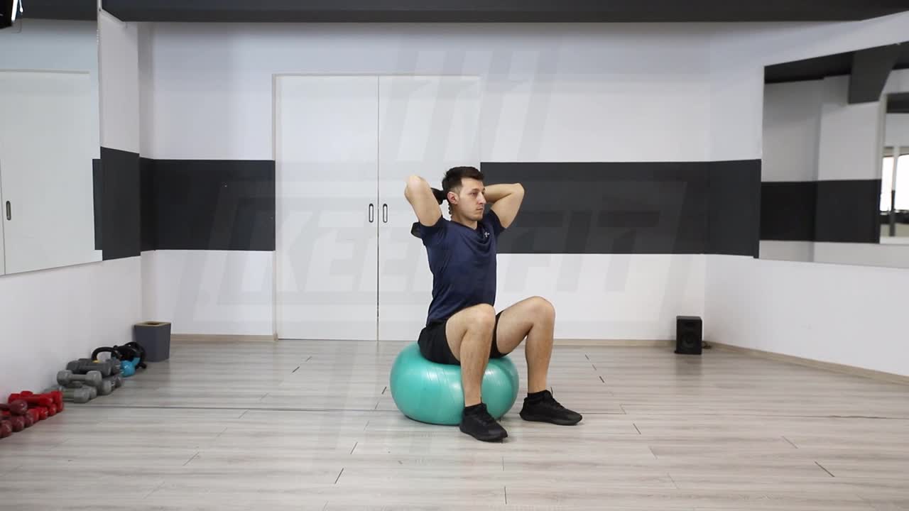 Swiss Ball Dumbbell Triceps Extension
