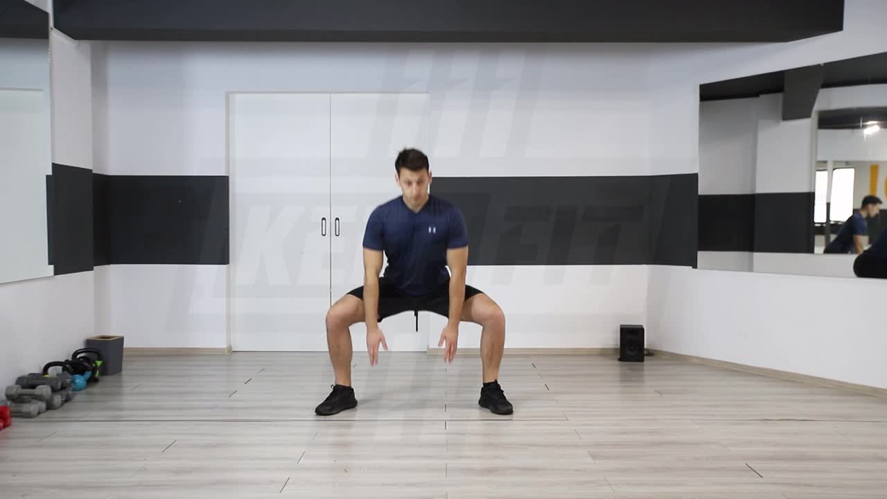Sumo Squat With Rotation