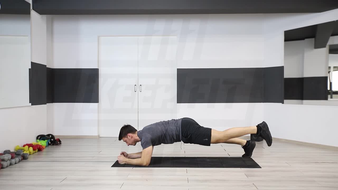 Wide-Stance Plank With Leg Lift