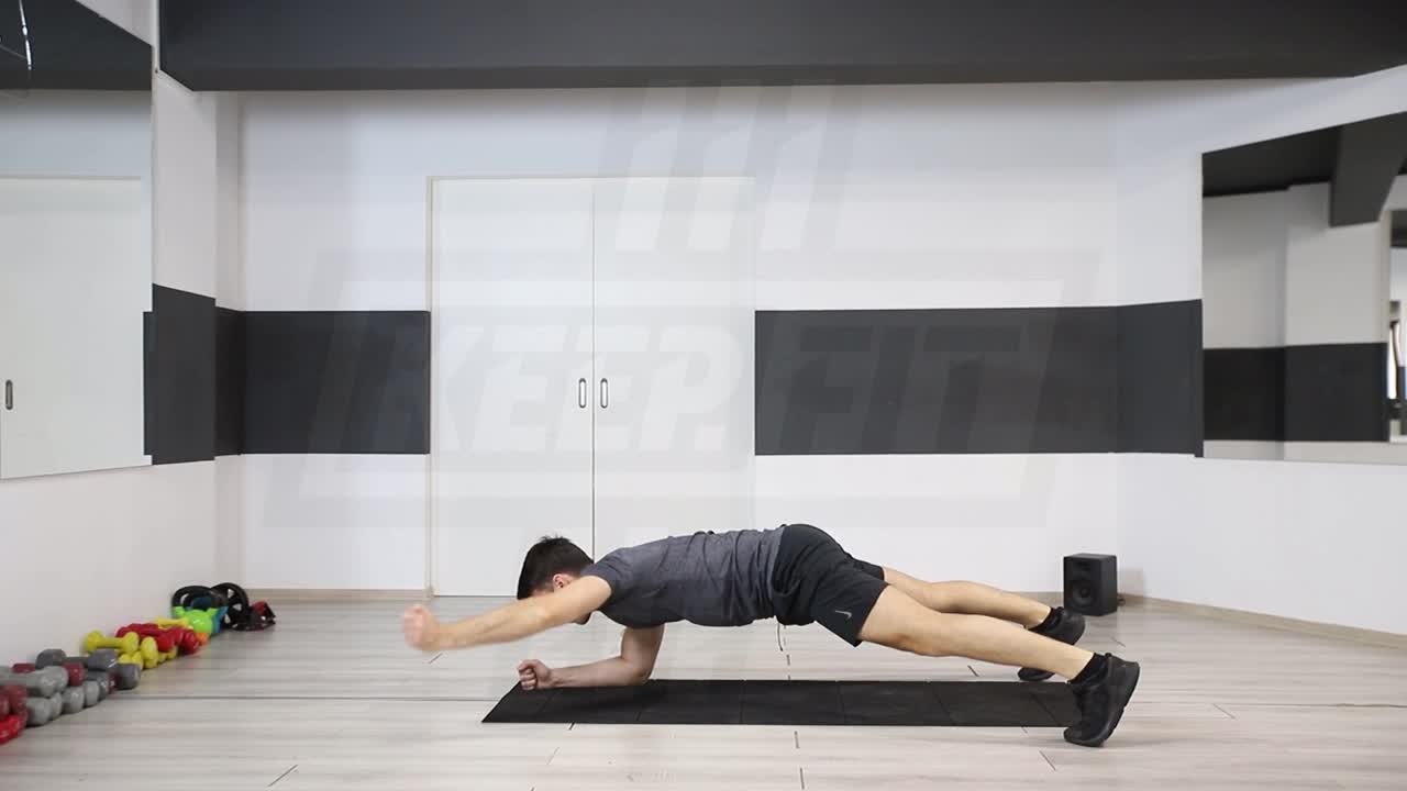 Wide-Stance Plank With Diagonal Arm Lift