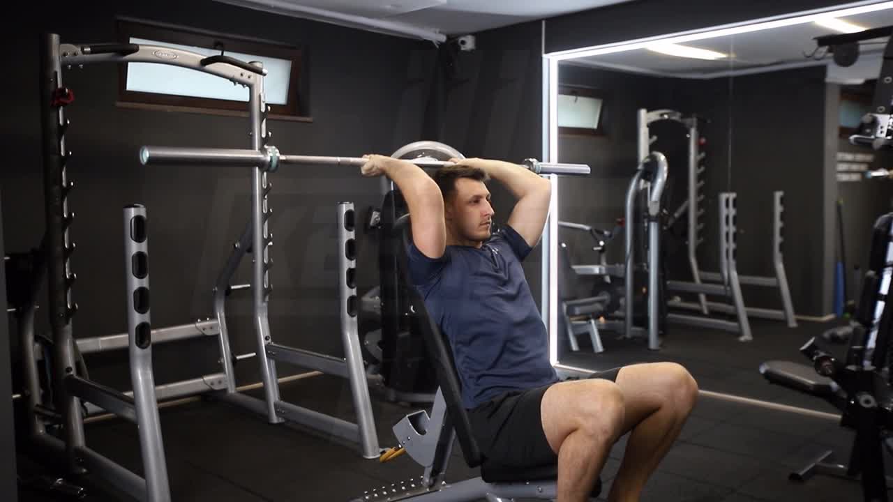 Seated Barbell Overhead Triceps Extension