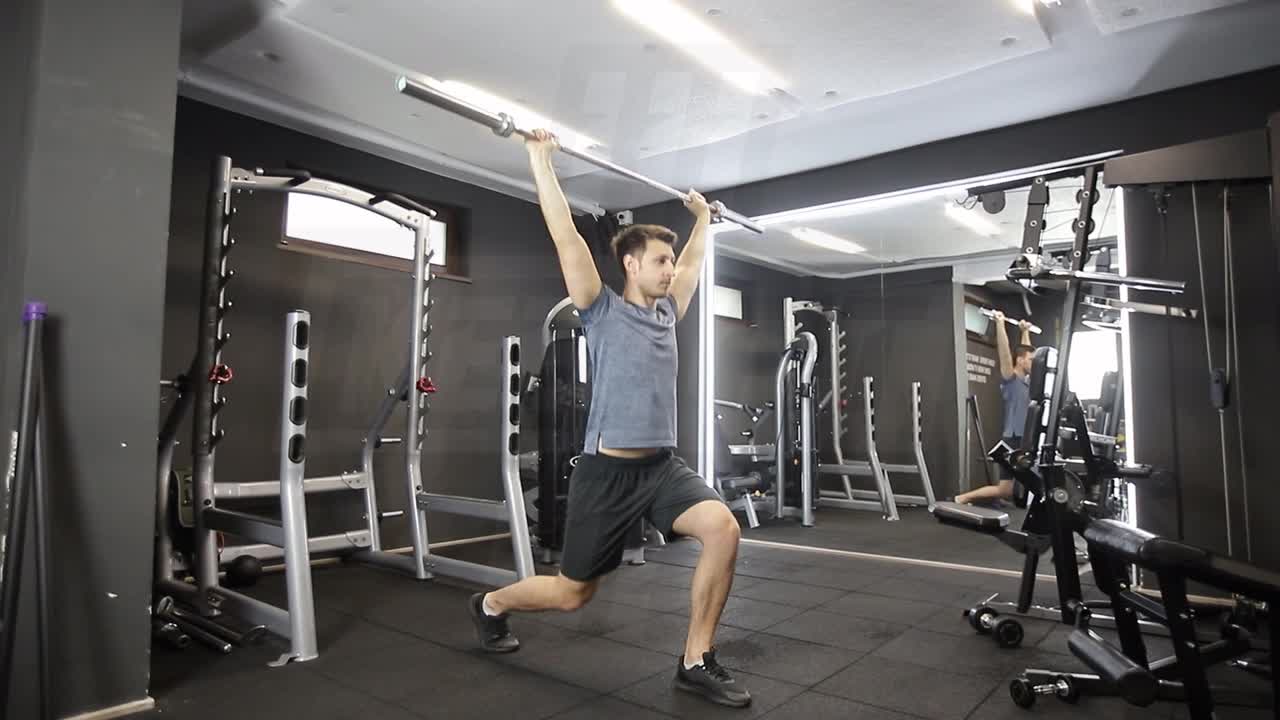 Wide-Grip Overhead Barbell Split Squat