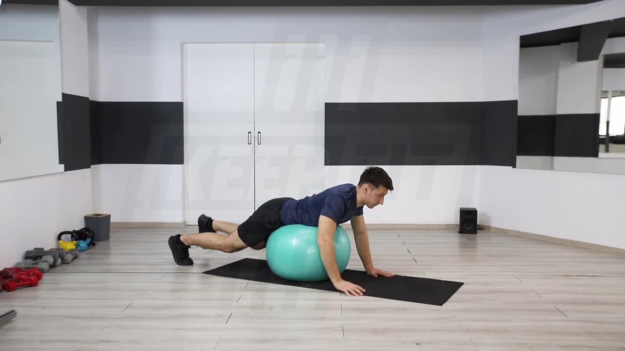 Swiss Ball Opposite Arm And Leg Lift