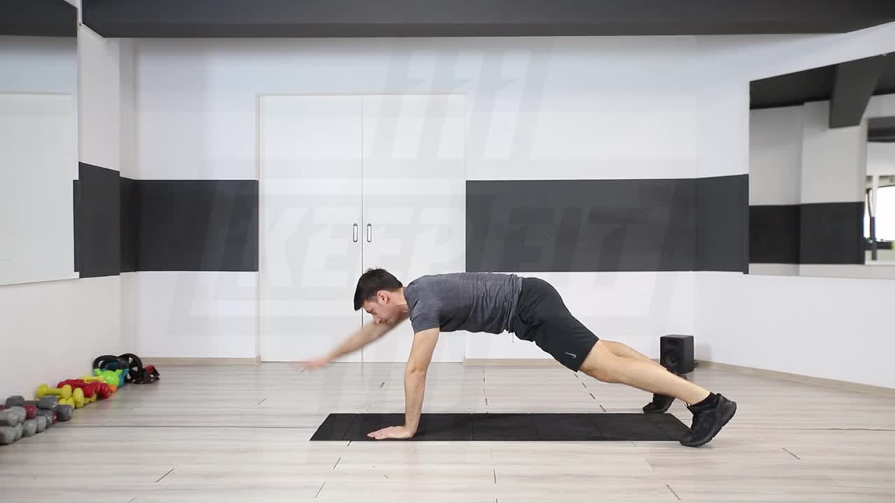 Plank With Arm Raise