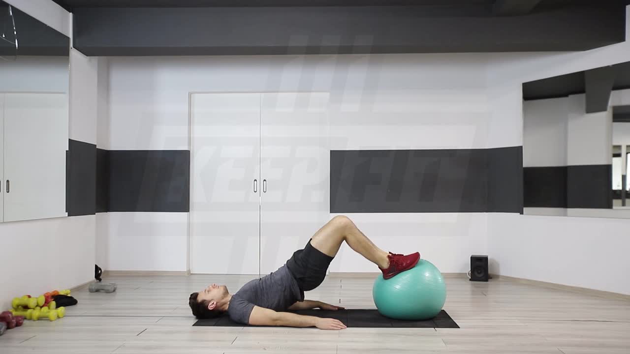 Hip Raise With Feet On Swiss Ball