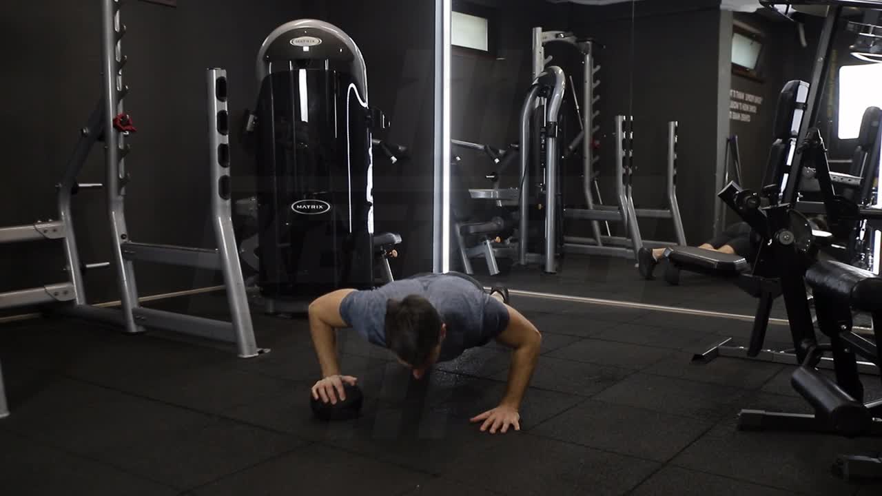 Single-Arm Medicine Ball Pushup