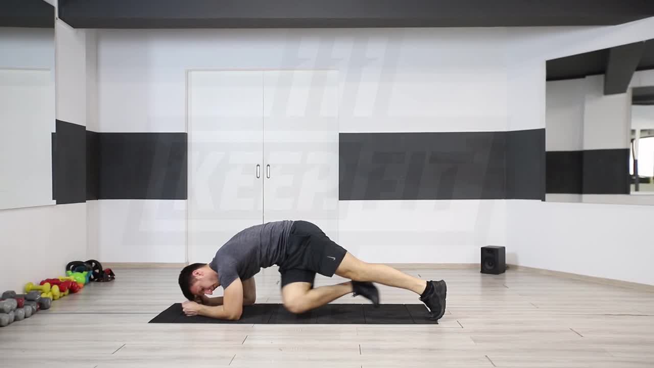 Plank Knee Twist