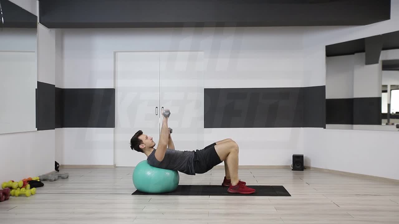 Alternating Dumbbell Chest Press On Swiss Ball