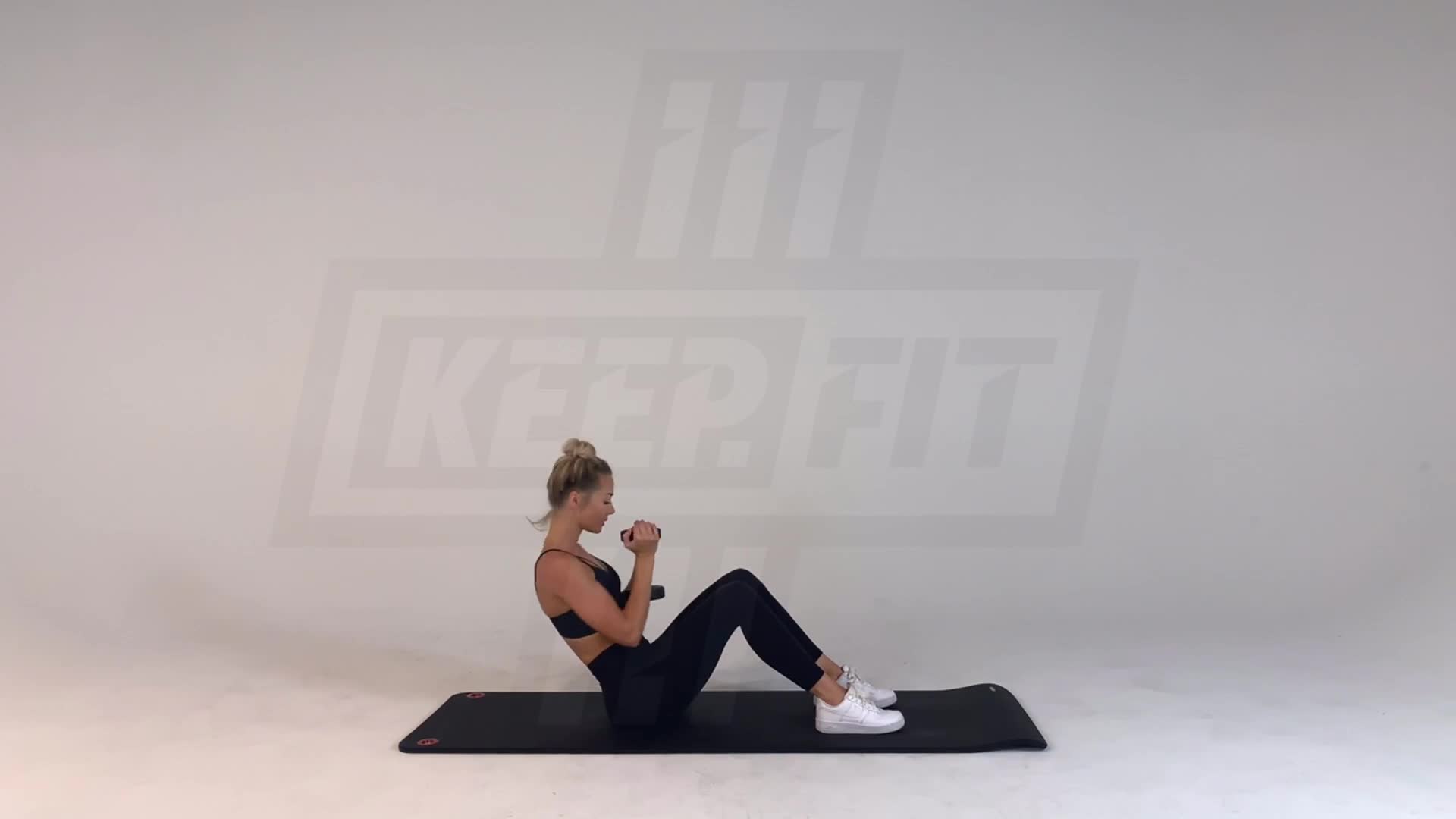 Dumbbell Russian Twists