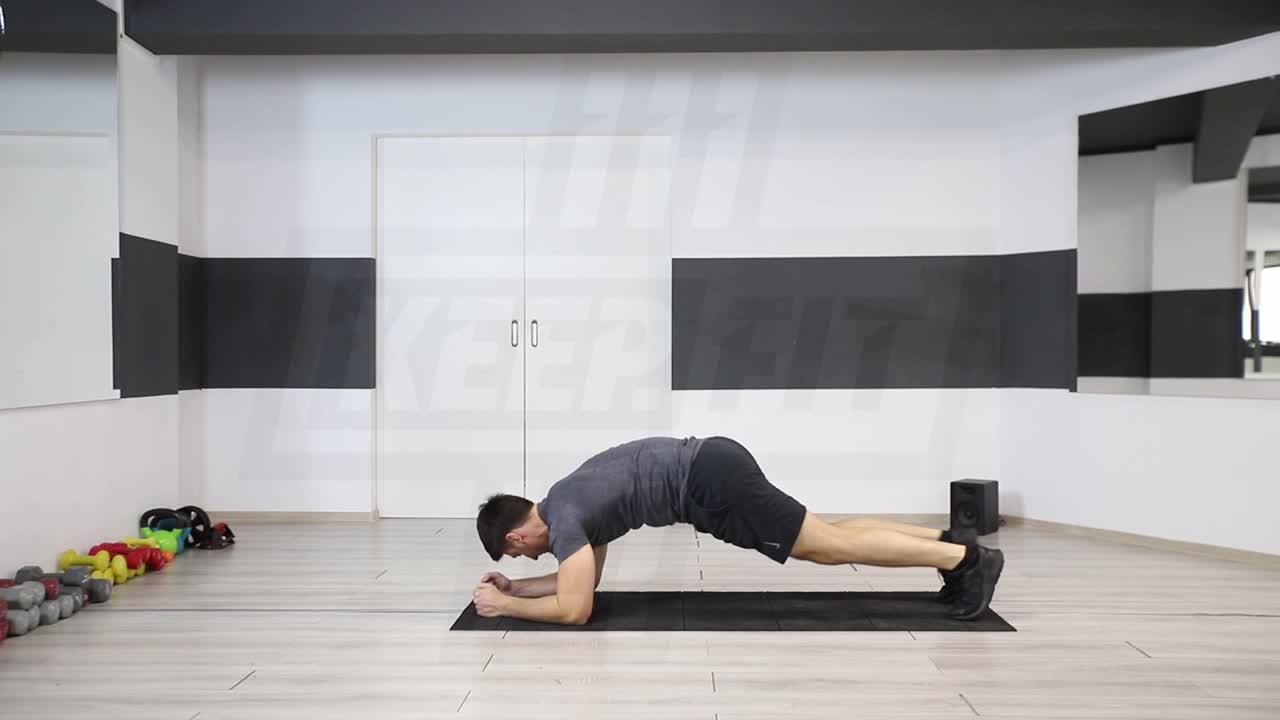 Plank With Oblique Crunch