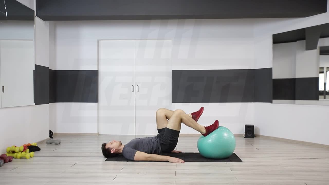 Marching Hip Raise With Feet On Swiss Ball