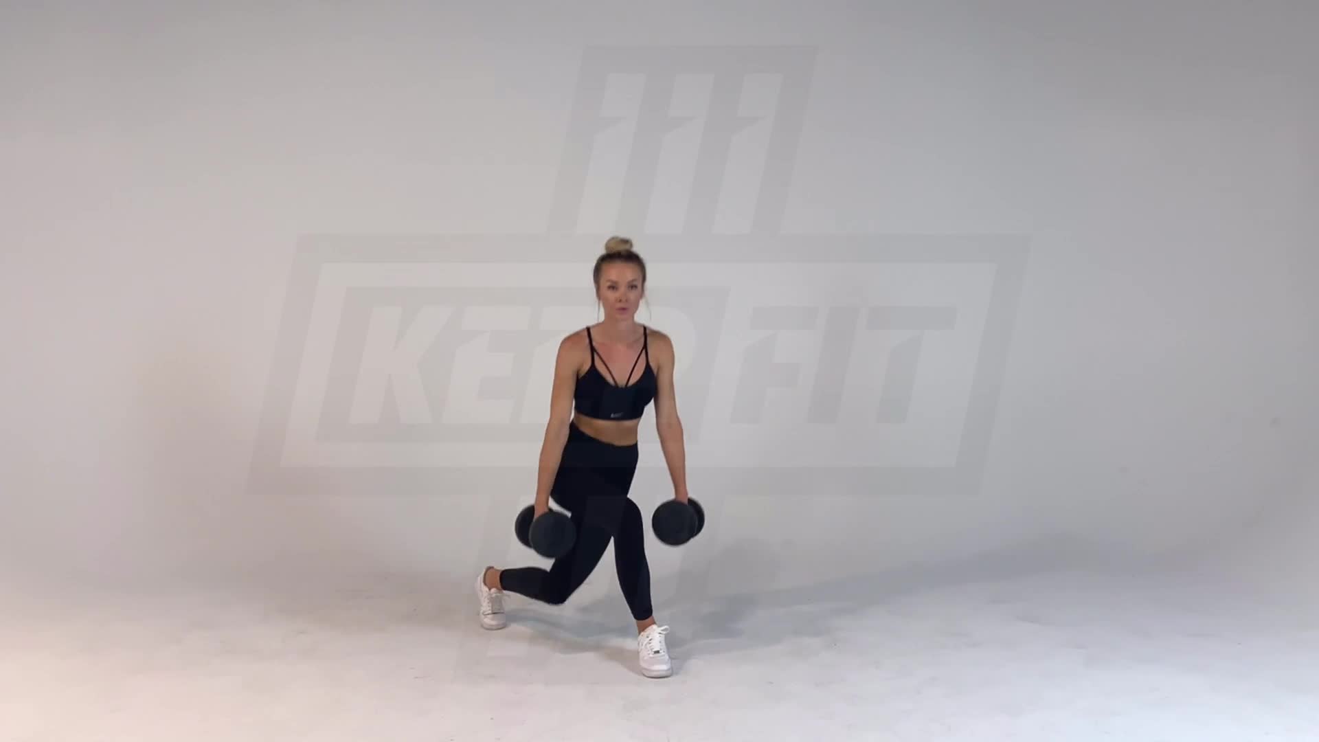 Dumbbell Reverse to Curtsy Lunge
